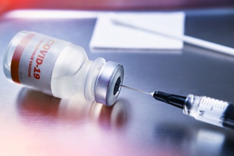 Covid-19 coronavirus vaccine on medical tray