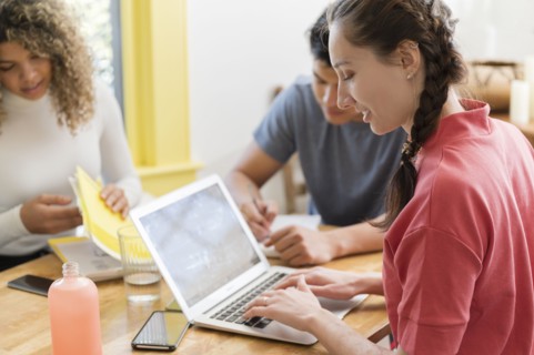 Coworkers working together in office