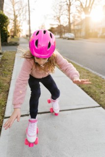 Rollerskating girl losing balance