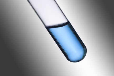 Close-up of test tube with blue liquid