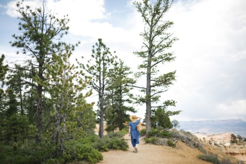 USA, Utah, Bryce Canyon, Woman walking along canyon
