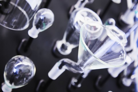 Laboratory glassware on black
