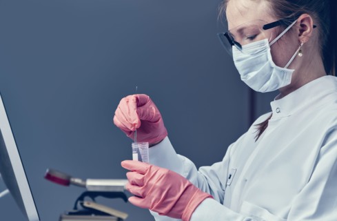 Female technician working in laboratory