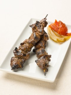 Steak kabob on plate