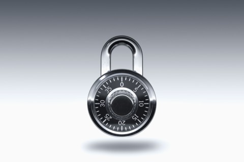 Padlock on gray background