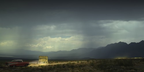 USA, Vintage car illuminating banner in desert
