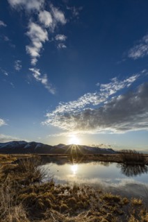 USA, Idaho, Sun Valley, Sunrise reflected in water