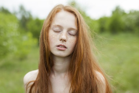 Portrait of teenage girl with red hair