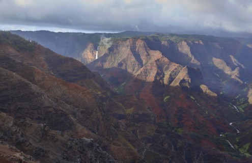USA, Hawaii, Kauai, Na Pali, Aerial view of mountain range with waterfall