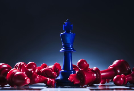 Studio shot of red and blue chess pawns symbolizing US Democratic and Republican parties