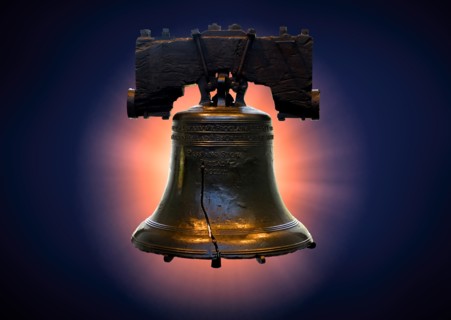 Liberty bell against blue,,