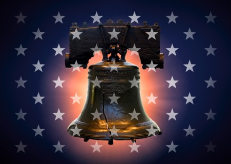 Liberty bell against blue,,