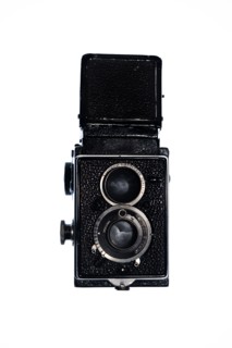 Retro twin lens reflex camera on white