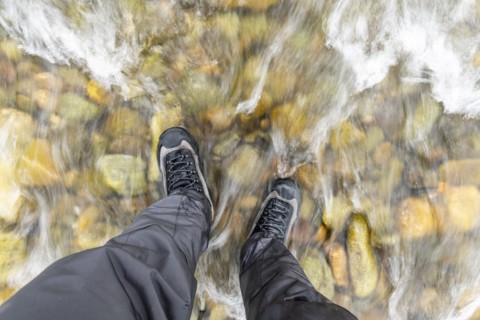 Man standing in river
