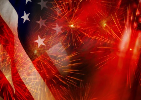 Digital composite of fireworks and american flag