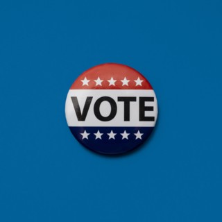 Vote badge on blue background