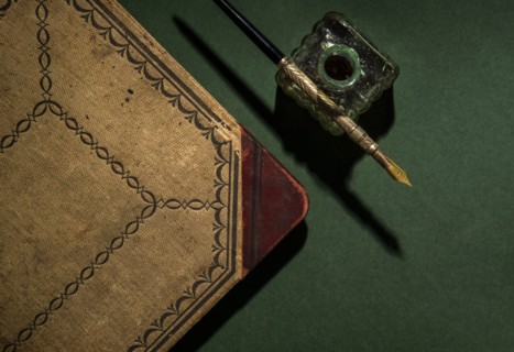 Antique ink well and pen