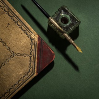 Antique ink well and pen