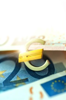 Euro symbol and euro bills
