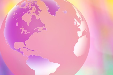Globe showing North and South America on pastel background