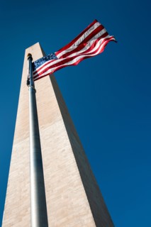 USA, Washington D.C., Washington monument and American flag