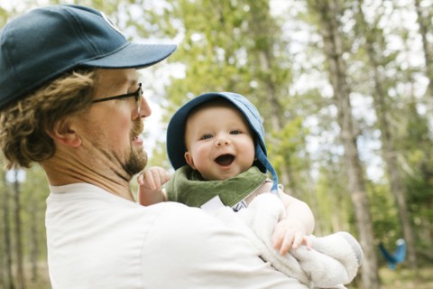 Father holding baby son