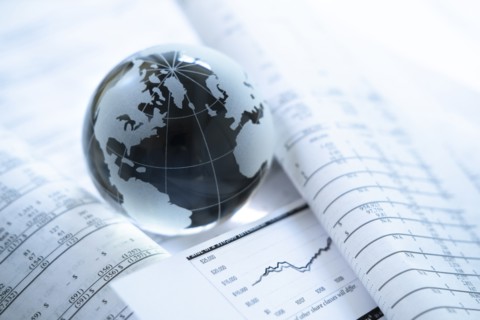 Glass globe an financial documents