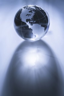 Glass globe on gray background