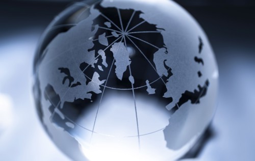 Glass globe on gray background