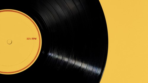 Vintage record on yellow background