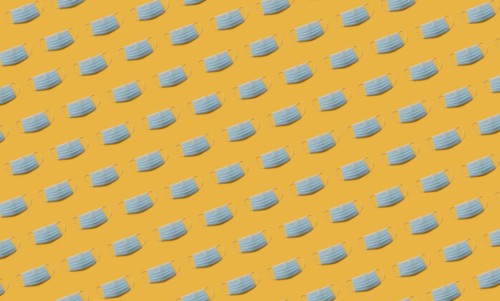 Flu masks on orange background