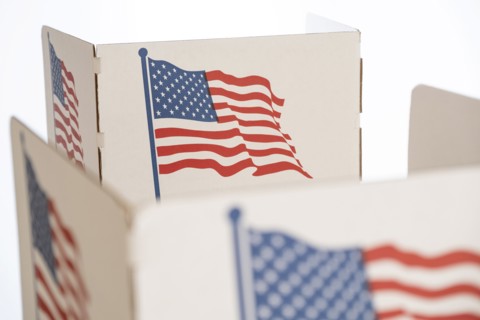 Voting booth with US flag