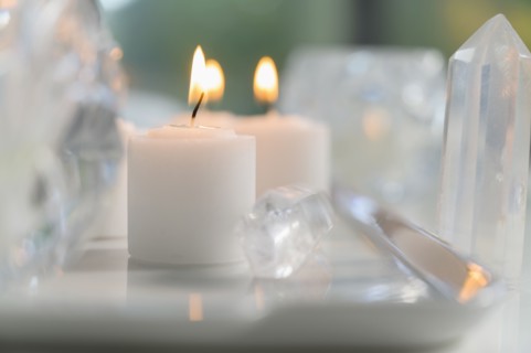 Composition of burning candles and crystals