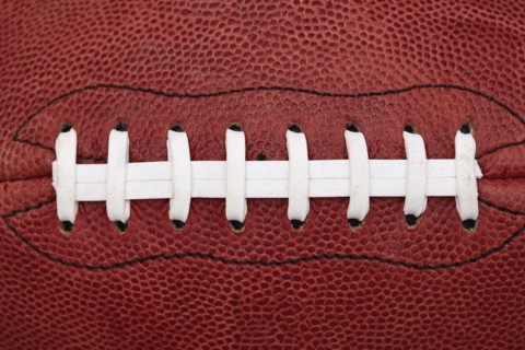 Close up of laces on american football ball