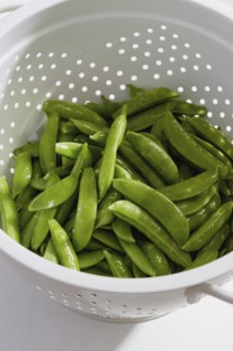 Green peas in colander