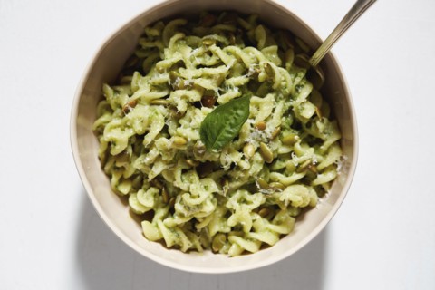 Pasta with avocado and basil in bowl