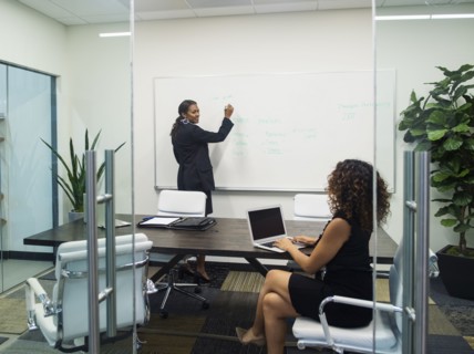 Two businesswomen working in office