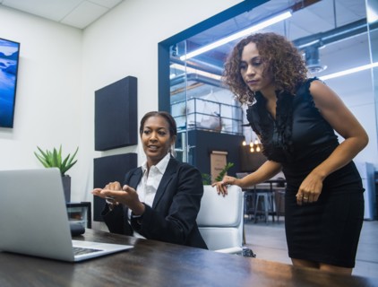 Two businesswomen working in office