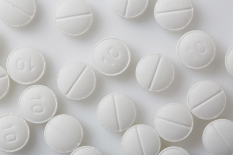 Pills on white background