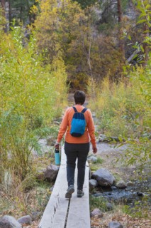 Woman hiking in Bandelier National Monument