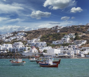 Fishing boats and town on coast