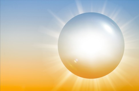 Sun glowing against sky