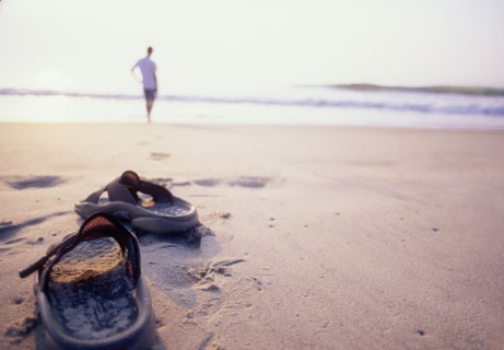 Person watching sunrise on beach