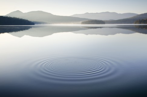 Ripples on calm lake surface