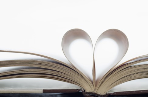 Book with pages folded in heart shape
