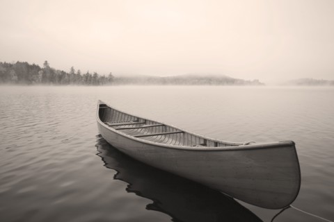 Empty canoe on Upper Saranac Lake