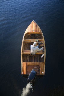 Man in motorboat on Lake Placid