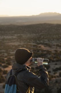 Female hiker taking break in Galisteo Basin Preserve