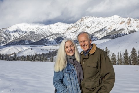 Winter portrait of senior couple in front of Boulder Mountains