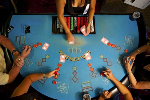 People playing poker in casino